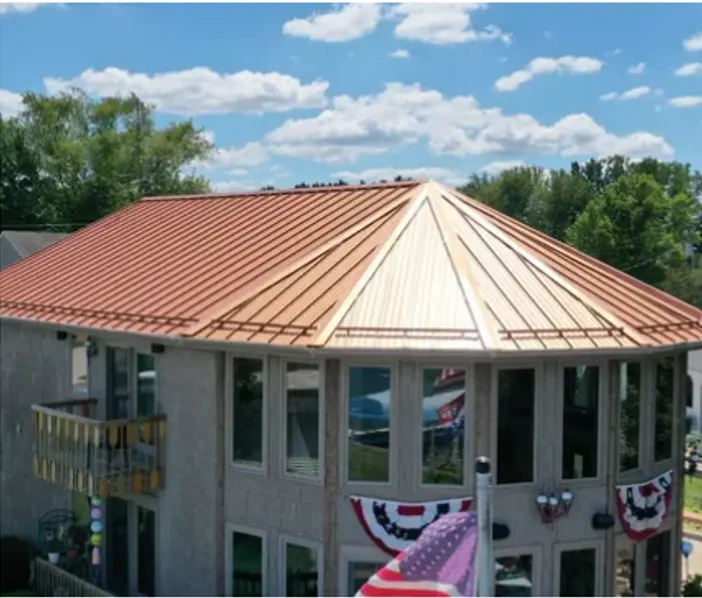 Tarping and dry-in on a Eaton commercial roof